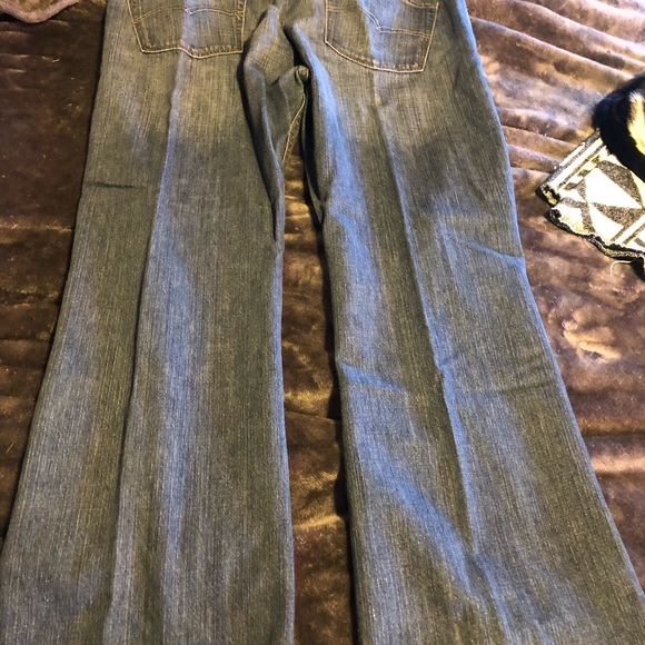 Men’s Levi’s Straight Leg Medium Wash Denim Jeans - Picture 4 of 8